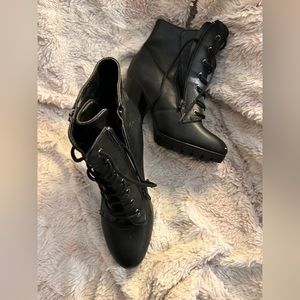 Black heel boots with side zippers